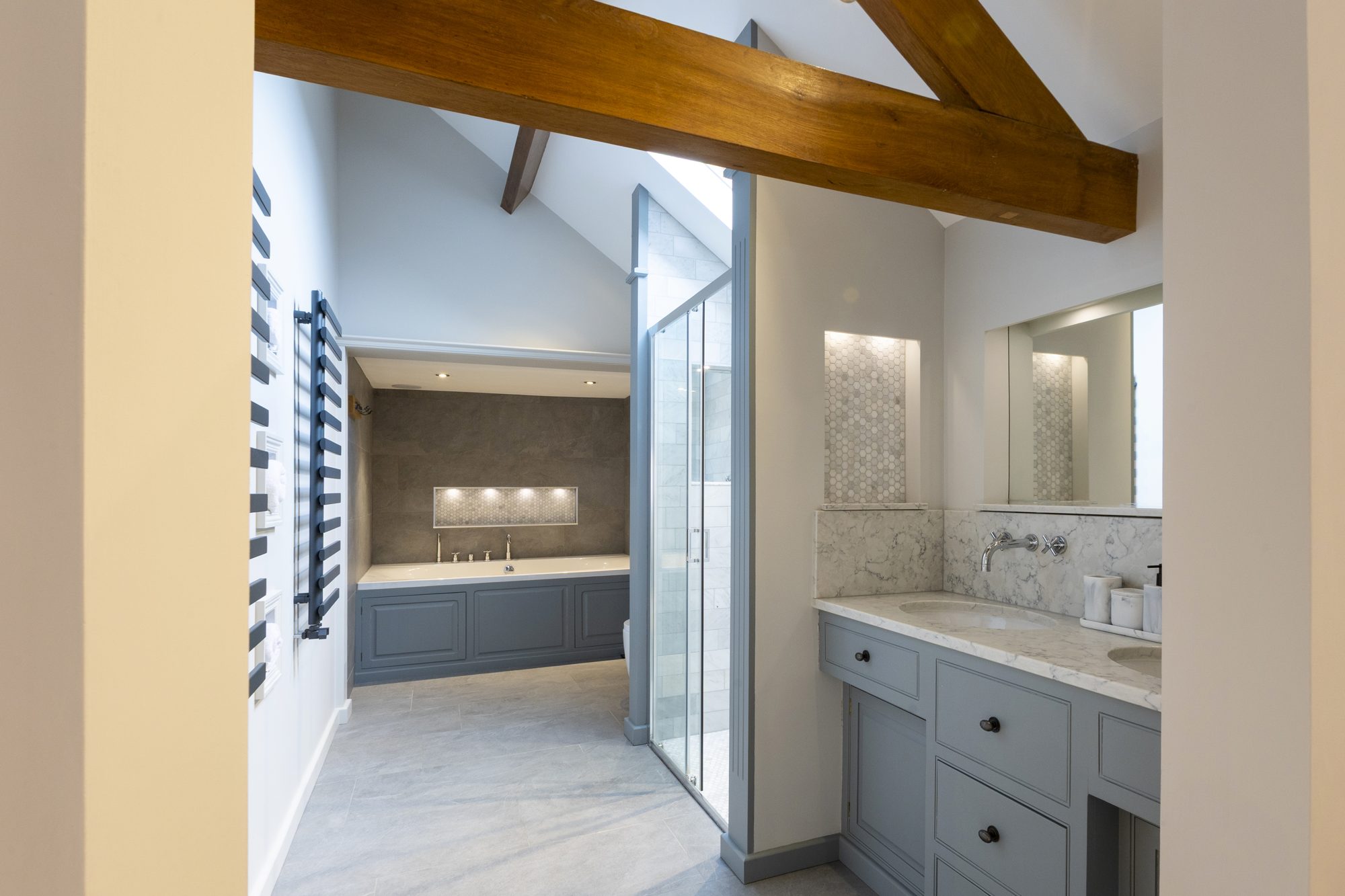 En-suite through double doors with bath and shower