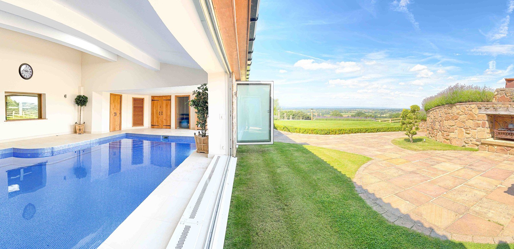 Poolside walkway with glass panel to the terrace