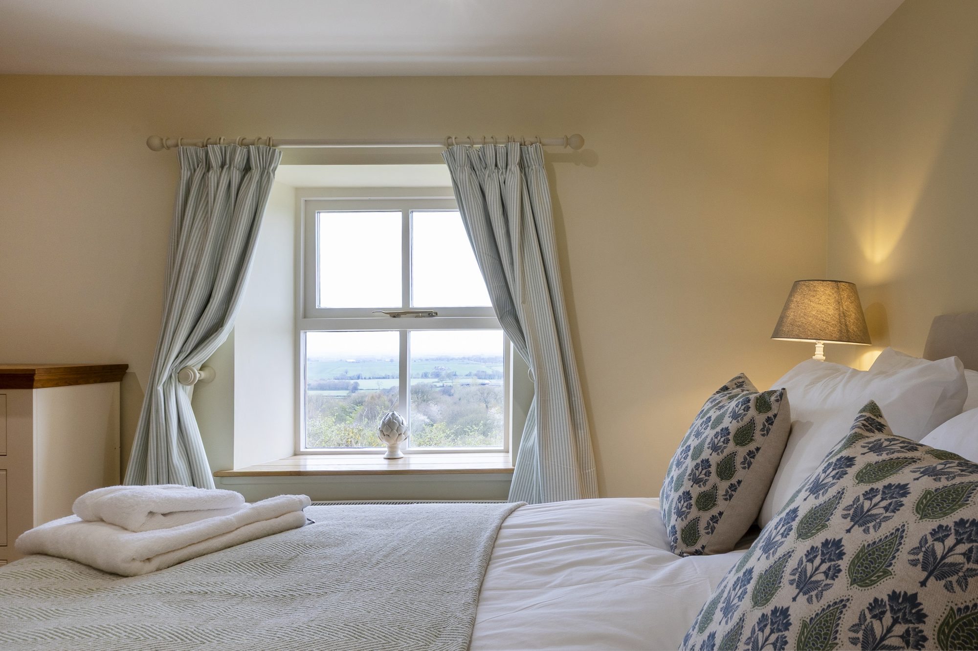 Bedroom 5 with countryside views from the window