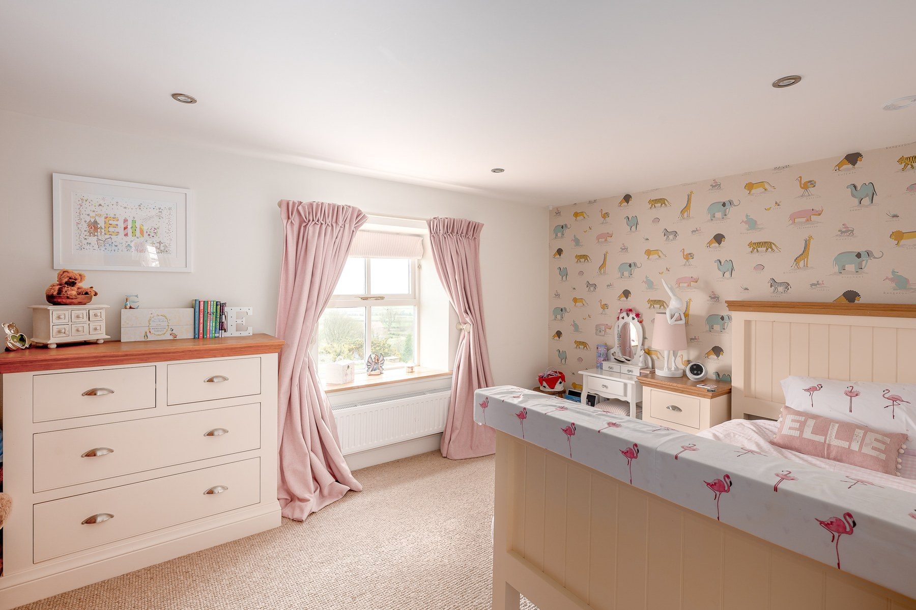 Children's bedroom with desk and window seat