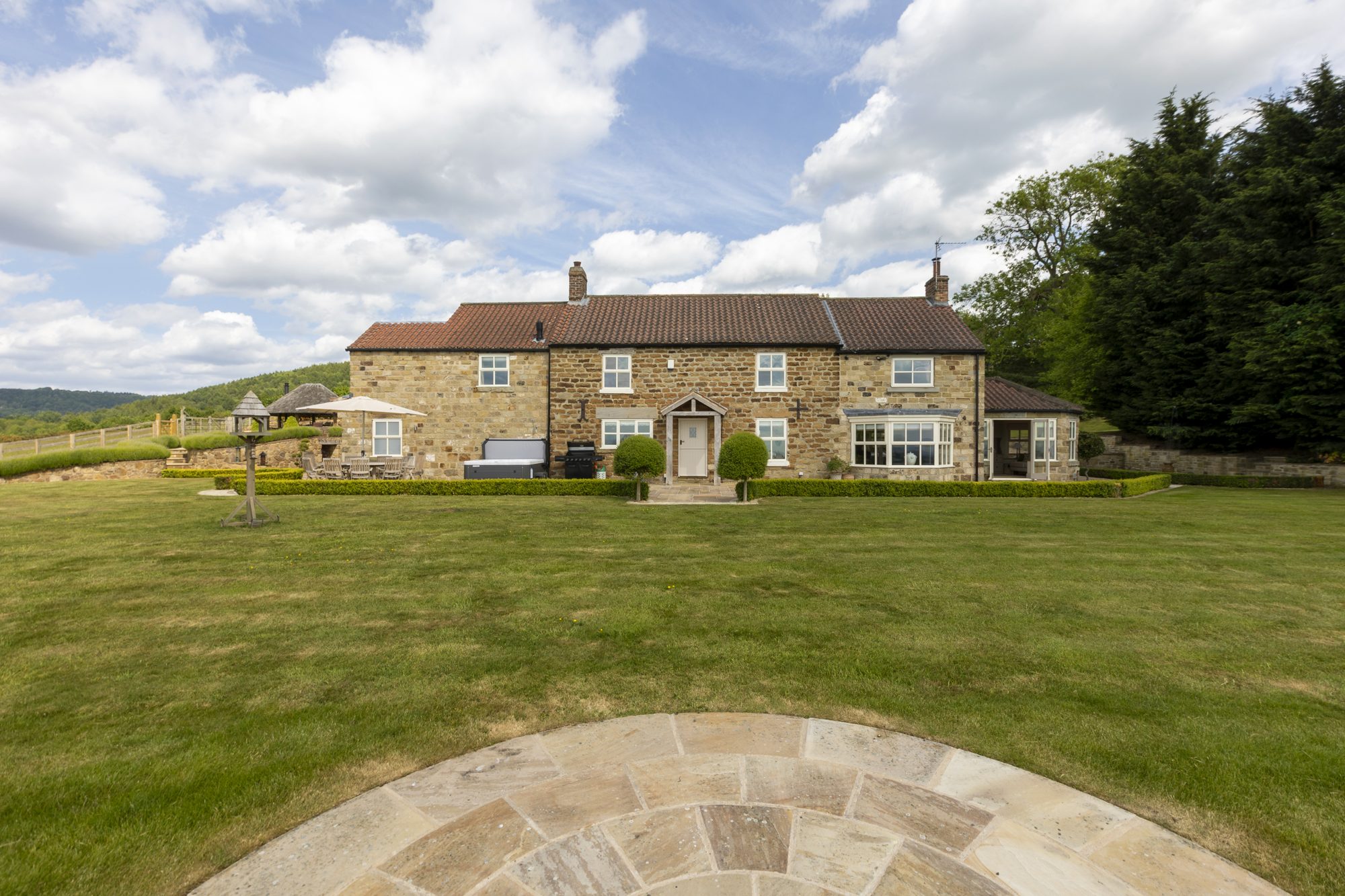 The house from the circular stone feature on the front lawn