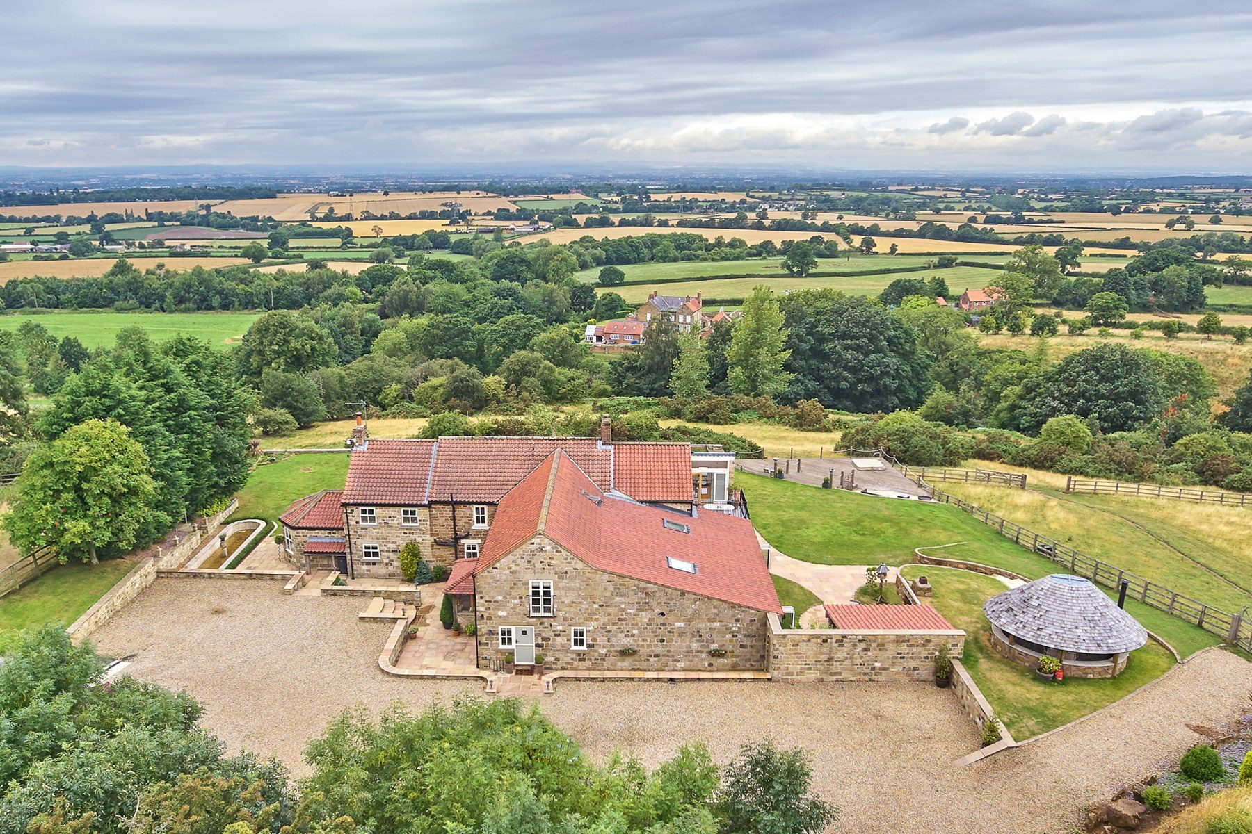 The property surrounded by its own paddocks and grounds