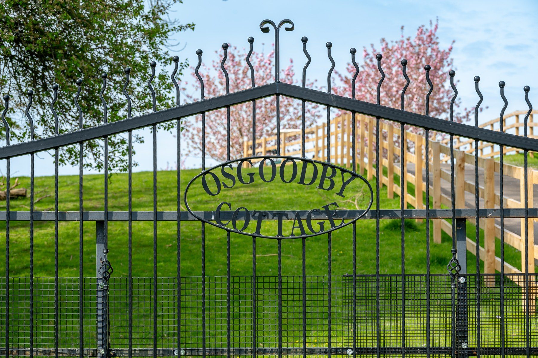 Wrought iron Osgoodby Cottage entrance gates