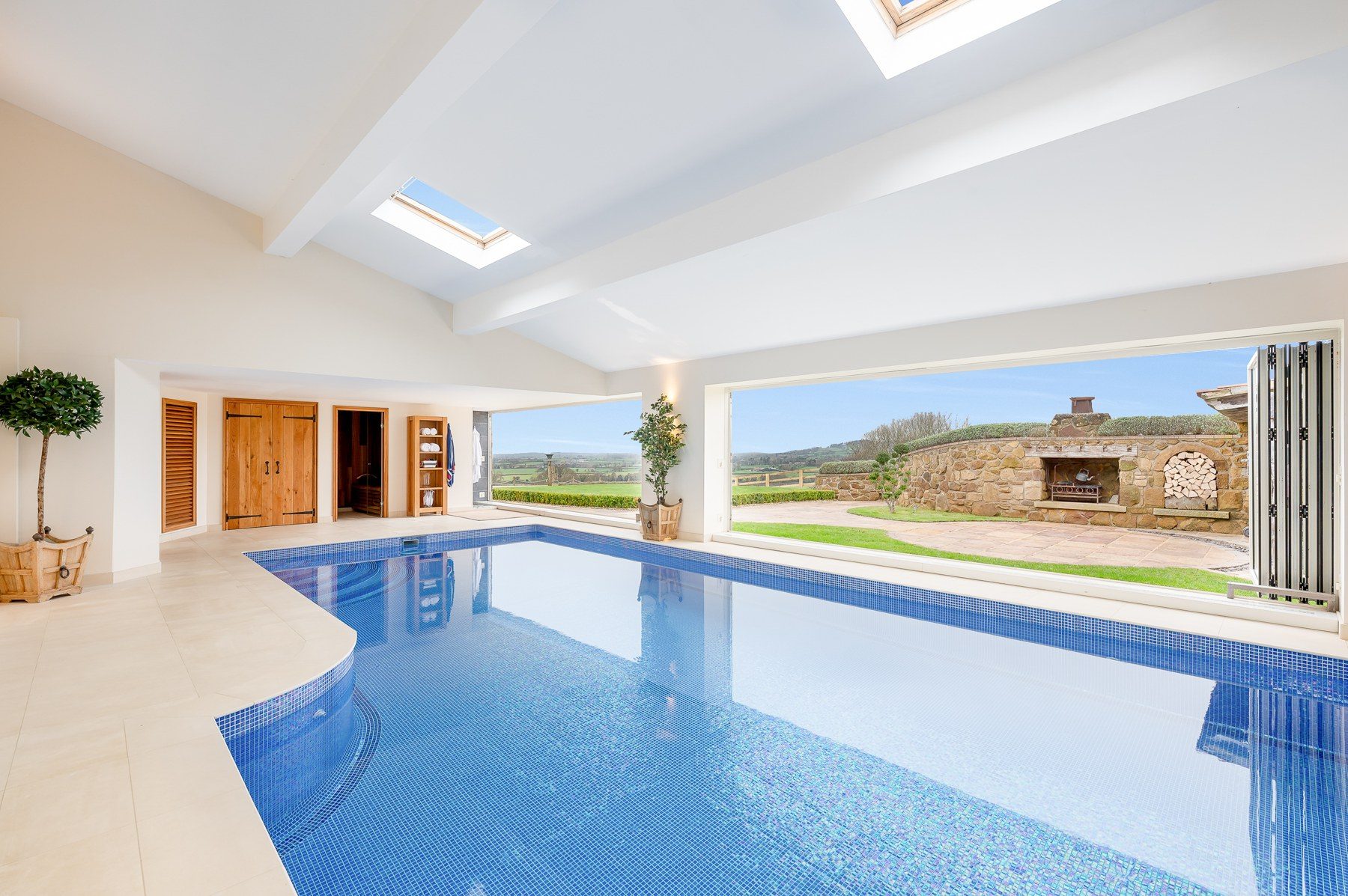 Indoor pool looking out across the fields