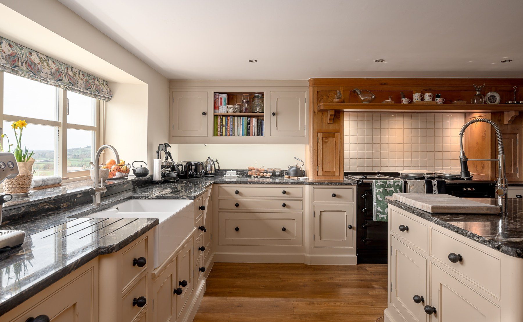 Country kitchen with granite worktops and range