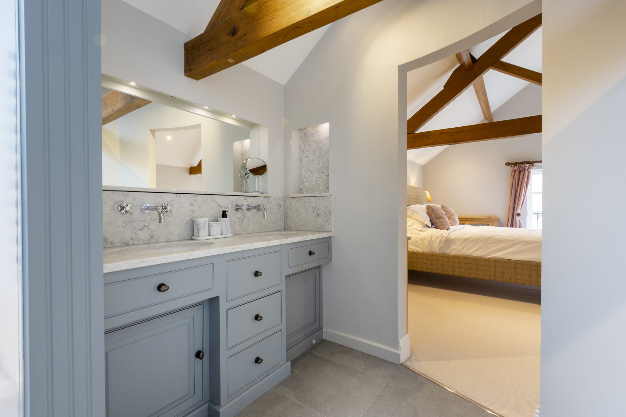 Beamed en-suite with double vanity